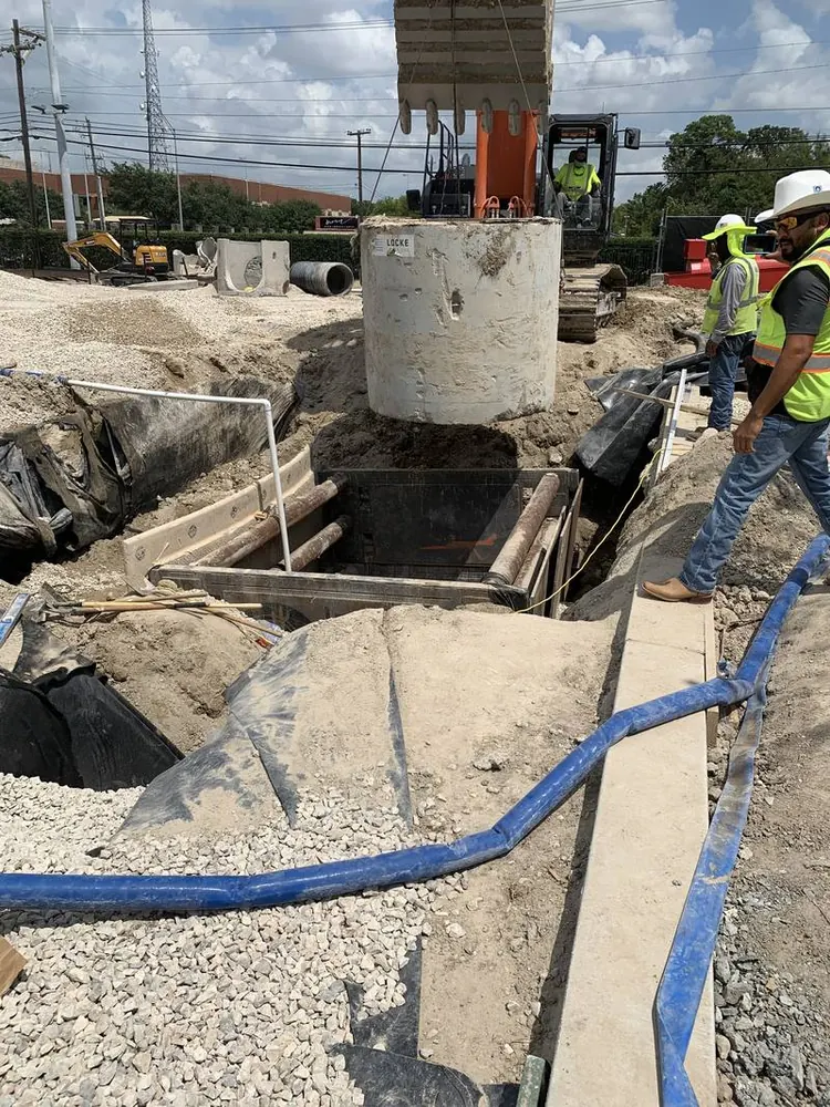 CMT technician performing nuclear density compaction testing on SH 99 highway project in Houston, Texas -- Citex CMT field inspection services